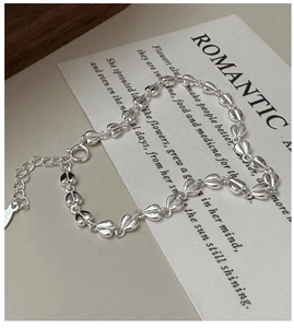Detail of S925 sterling silver heart link bracelet with adjustable chain and lobster clasp