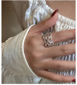 Detailed view of S925 silver ring featuring irregular organic multi-layer intertwined design