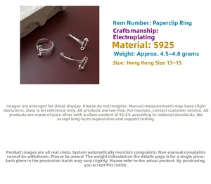 Macro shot of S925 sterling silver safety pin ring with minimalist layered line design