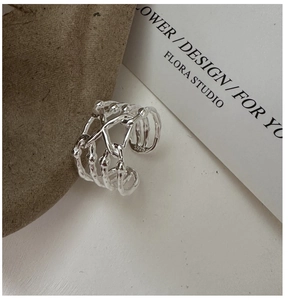 Close-up of S925 sterling silver ring with multi-layer hollow branch design details