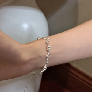 Elegant S925 sterling silver beaded bracelet with adjustable chain for modern women