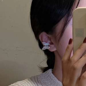 Minimalist S925 sterling silver butterfly ear cuff with textured metal wing design