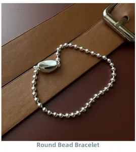 Detailed view of S925 silver beaded bracelet featuring a polished oval clasp on leather