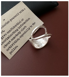 Detailed close-up of S925 sterling silver ring featuring unique hammered matte texture