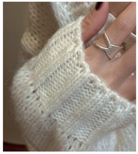 Minimalist S925 sterling silver double-layer cross ring worn with a white knit sweater