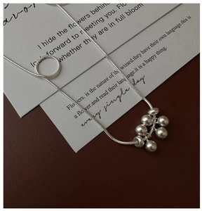 Detail of S925 sterling silver frosted grape bead pendant on a snake bone chain necklace
