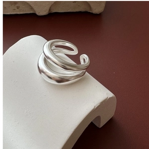 Detailed close-up of matte S925 sterling silver double-layered minimalist open ring