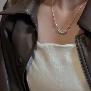 Minimalist S925 sterling silver necklace with five polished beads on a delicate chain