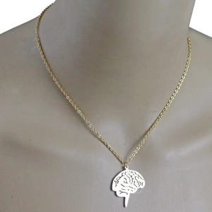 Polished gold anatomical brain pendant necklace featuring intricate hollowed design