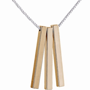 Close-up of triple gold cuboid column pendants on a silver box chain necklace
