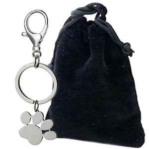 Custom stainless steel pet paw print keychain with elegant black velvet gift pouch
