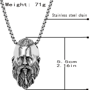Detail of a vintage Viking warrior pendant in stainless steel with 5.5cm height and 71g weight