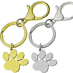 Polished titanium steel paw print keychain set in gold and silver finishes