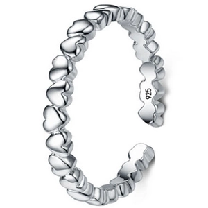 Detail showing S925 hallmark on the inner band of heart shaped silver open ring