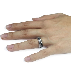 Retro silver wheat ear engraved geometric ring shown on hand with a vintage finish