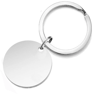 Close-up of polished silver metal round keychain tag for personalized DIY engraving