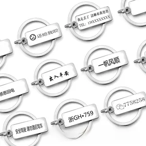 Customized stainless steel rectangle keychains featuring personalized laser engravings