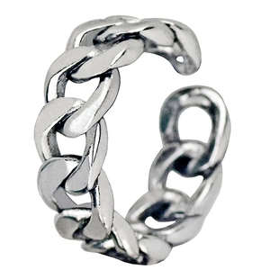 Macro detail of adjustable Cuban link chain ring with silver finish and open design