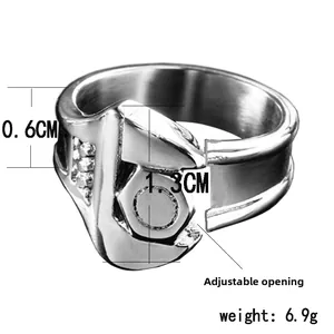 Macro view of adjustable punk wrench ring with brushed finish and side inlaid stones