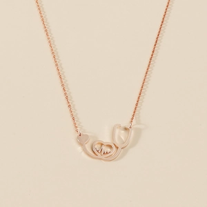 Rose gold stethoscope heart necklace with heartbeat line pendant for medical professionals