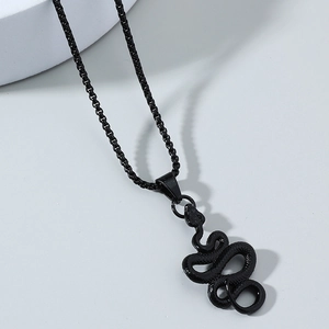 Close-up of black snake pendant showing detailed scale texture and box chain