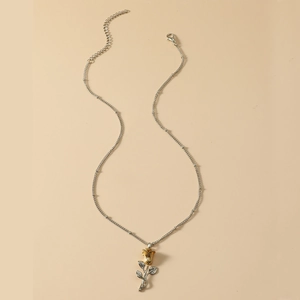 Detail of two-tone rose pendant necklace with adjustable extension chain and lobster clasp