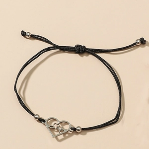 Bracelet cordon noir tissé réglable avec pendentif cœur et ligne de battement de cœur