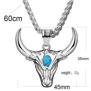 Close-up of bull skull pendant with turquoise stone, 35mm x 45mm on 60cm steel chain