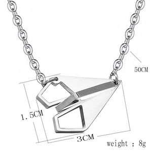 Macro shot showing dimensions of silver paper plane pendant with 50cm chain necklace