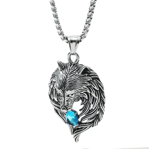 Collier tête de loup vintage avec pendentif en pierre bleu ciel et chaîne à maille