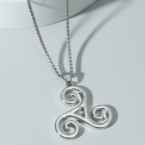 Silver Triskele necklace featuring a Celtic Triskelion pendant with a sleek square link chain