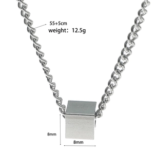Detail of silver stainless steel cube pendant with measurements 8mm and 55cm chain