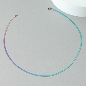 Detail view of 8mm iridescent titanium steel twist chain with colorful metallic finish