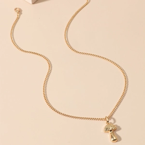 Collier pendentif champignon doré minimaliste avec finition polie et chaîne délicate
