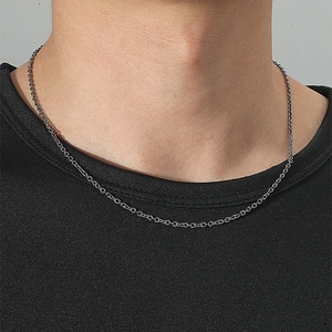 Detail shot of 8mm titanium steel twist chain necklace worn by a male model