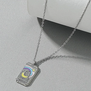 Macro view of silver tarot necklace pendant showing the Empress III card with colorful enamel