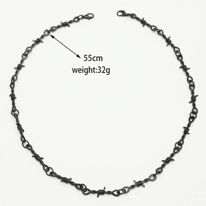 Detail view of 55cm black punk thorn necklace showing 32g weight and lobster clasp closure