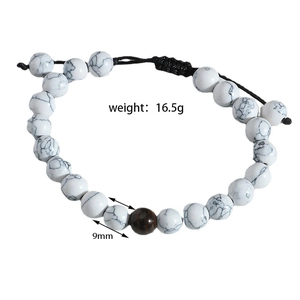 Detail of 9mm white turquoise beads with adjustable black braided cord weighing 16.5g