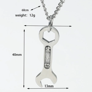 Detailed view of wrench pendant with 13 14 engraving and size measurements in cm