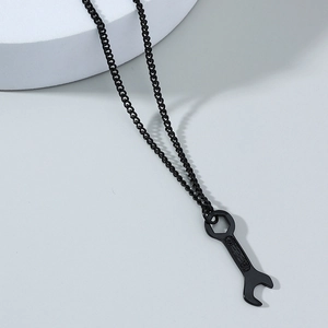 Detailed view of matte black wrench pendant necklace with number 13 engraving and chain