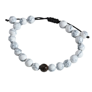 White turquoise and tiger eye beaded braided bracelet with adjustable black cord