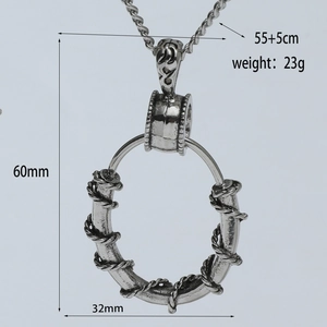 Detail showing dimensions of retro thorn ring pendant necklace in steel finish