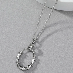 Mens vintage titanium steel necklace with thorn-wrapped oval circle pendant in retro silver