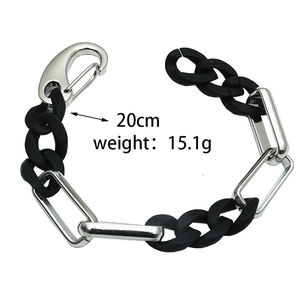 Detail of matte black and silver chain bracelet with a carabiner clasp, 20cm length