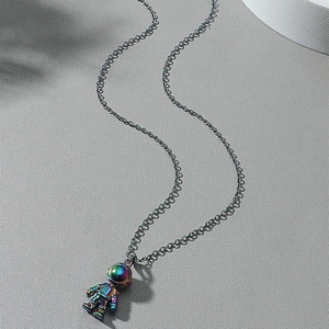 Iridescent astronaut pendant necklace with metallic dark grey chain in street hip hop style