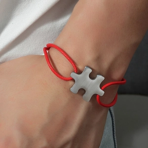 Custom engraved red braided puzzle bracelet in stainless steel for couples and friendship