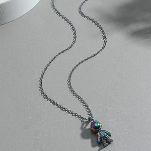 Street style 3D astronaut pendant necklace with iridescent plating on a gunmetal chain
