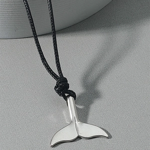 Minimalist silver whale tail pendant on adjustable black woven cord necklace for all