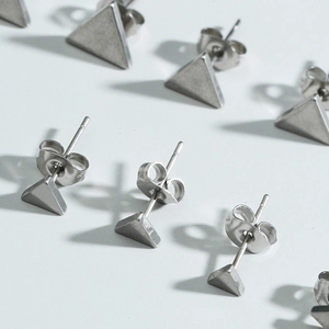 Polished stainless steel geometric triangle stud earrings with butterfly backings