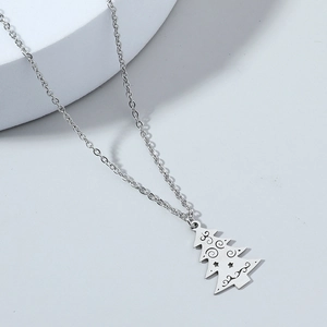 Collier avec pendentif sapin de Noël en acier inoxydable argenté et motifs d'étoiles
